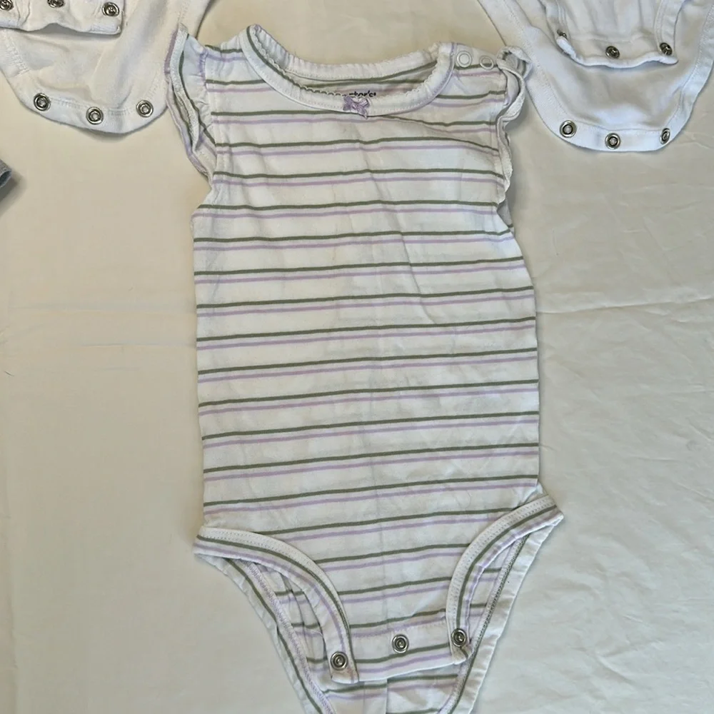 Carter's size 9 months bundle Pink and White Bodysuits Set for Everyday Comfort.
